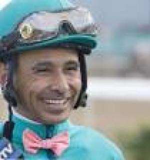 WHAT JOCKEY HOLDS THE RECORD FOR WINNING THE ARKANSAS DERBY?
