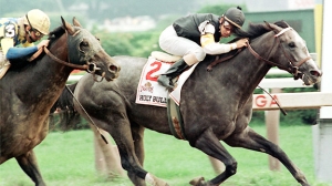 WHAT HORSE HOLDS THE FASTEST RECORD IN WINNING THE HOLY BULL STAKES?